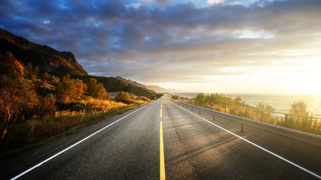 open road at sunrise
