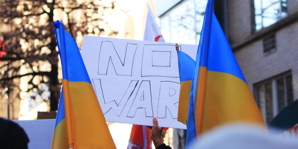 no-war-sign-ukranian-flags
